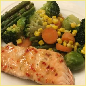 Photo of salmon fillet in sweet chilli sauce with mixed vegetables